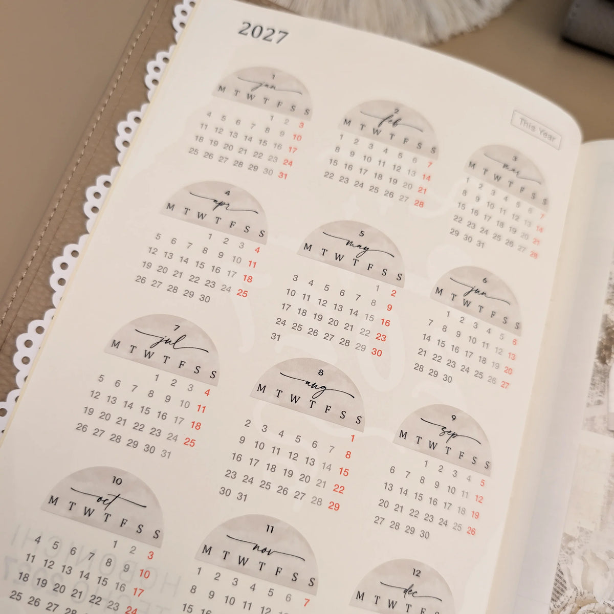Douce Mémoire 2027 calendar stickers installed in a Hobonichi Cousin