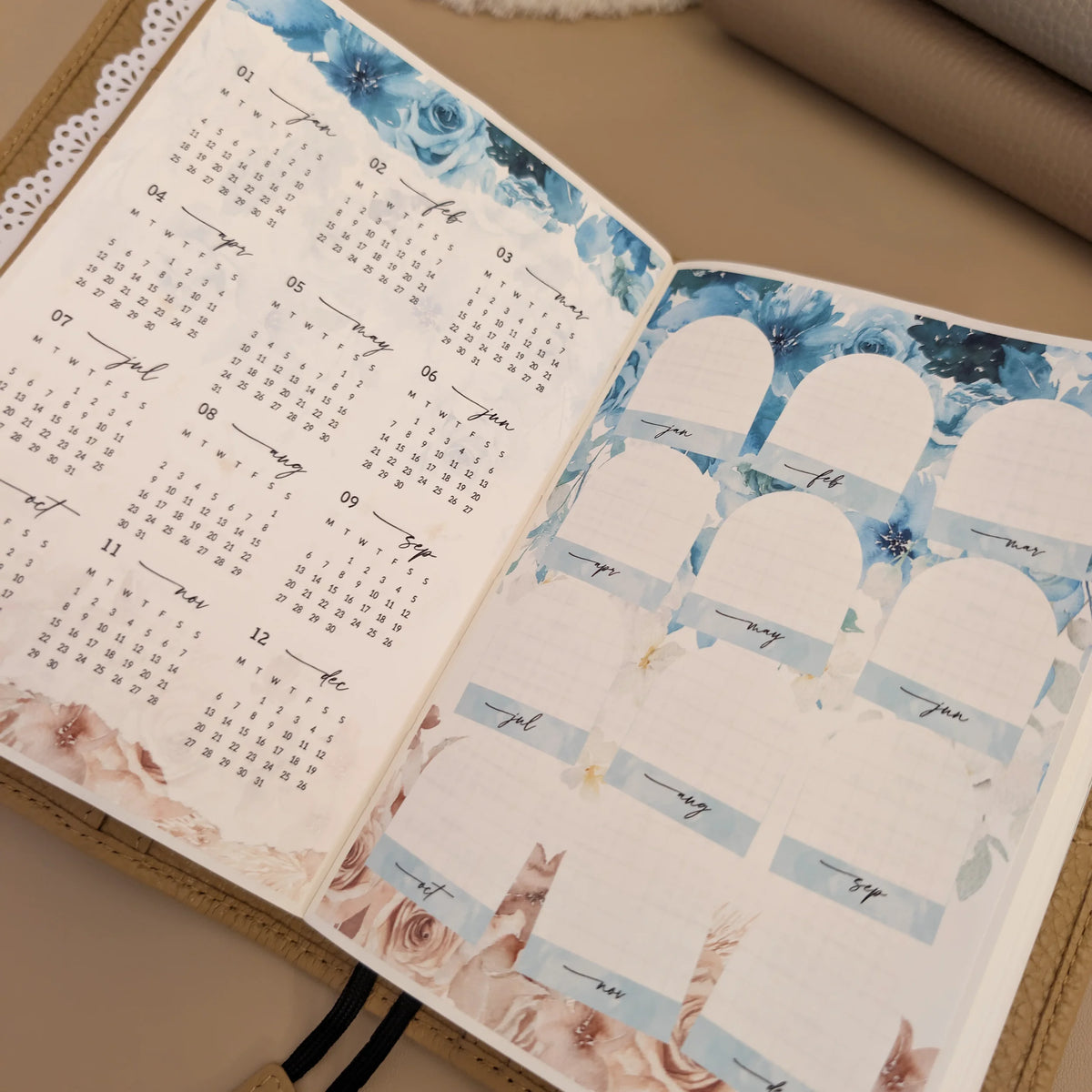 Brise Océane 2027 yearly overview calendar and monthly planning stickers installed in a Hobonichi Techo A6