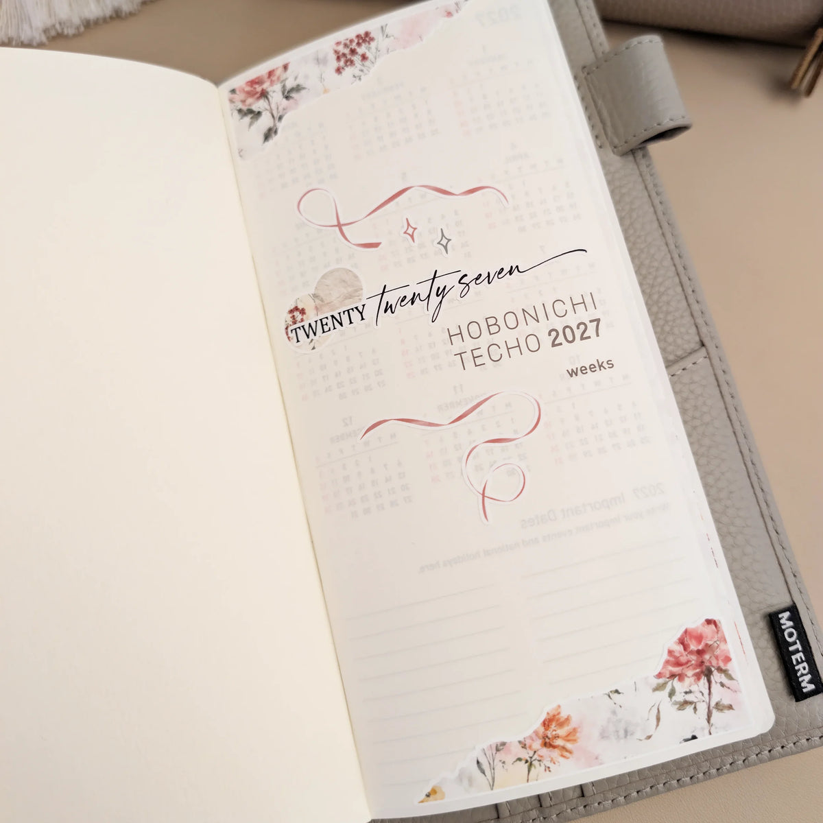 Jardin Poudré 2027 title stickers installed on the opening page of a Hobonichi Weeks