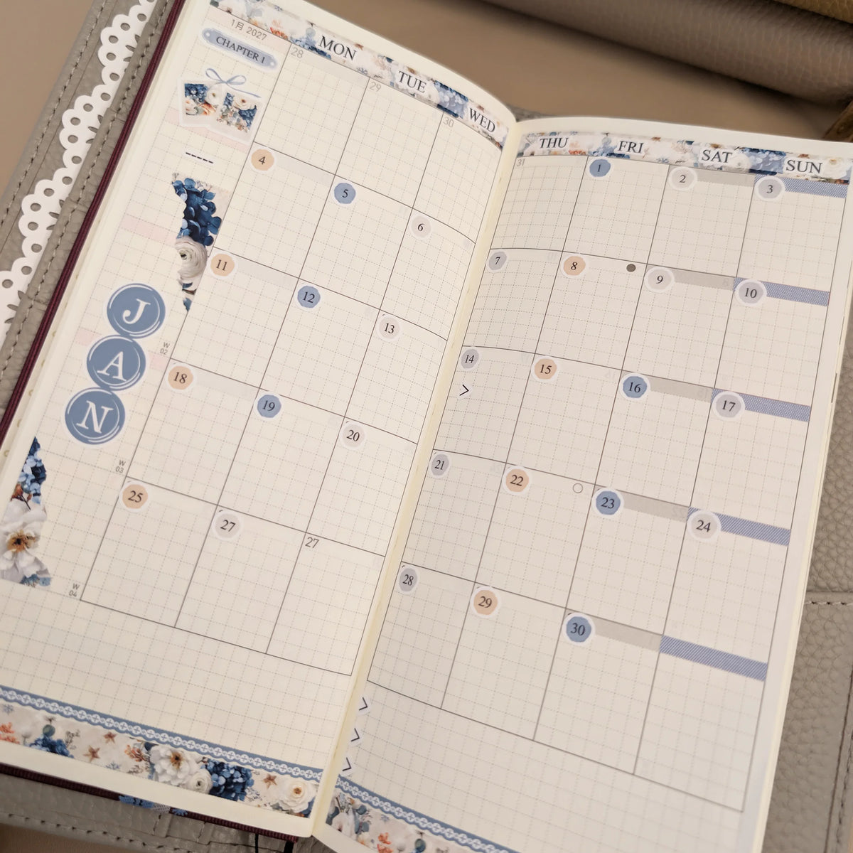 January floral monthly sticker kit installed in a Hobonichi Weeks calendar